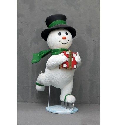 FIGURA MUÑECO DE NIEVE PATINANDO CON REGALO